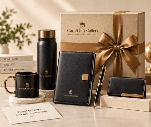Executive gift set with black flask, mug, diary, pen and card holder beside a kraft gift box